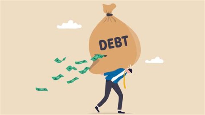 Be in debt