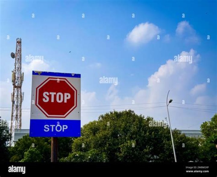 Come ___ complete stop: 2 wds.