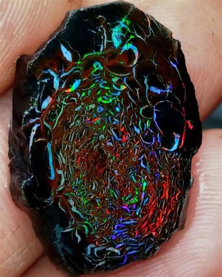Gem with matrix and fire varieties