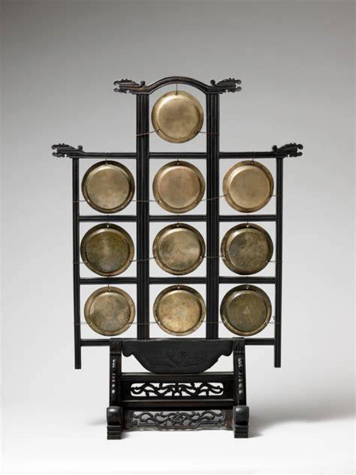 Large bronze instruments struck with mallets