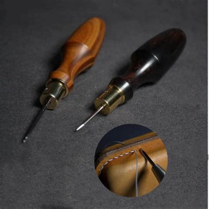 Leather-piercing implement