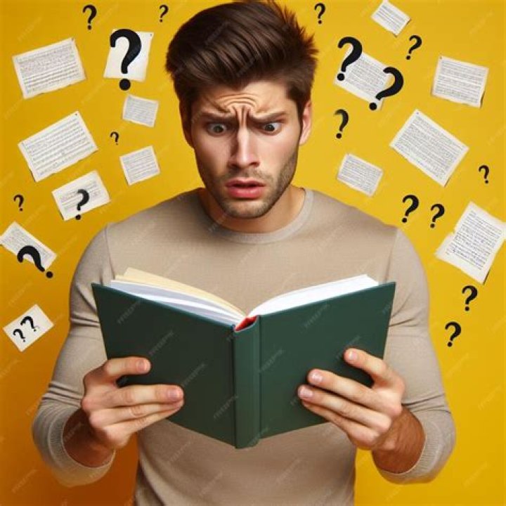 Person reading a computer manual probably