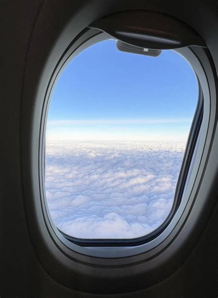 Plane part viewable through an airplane window