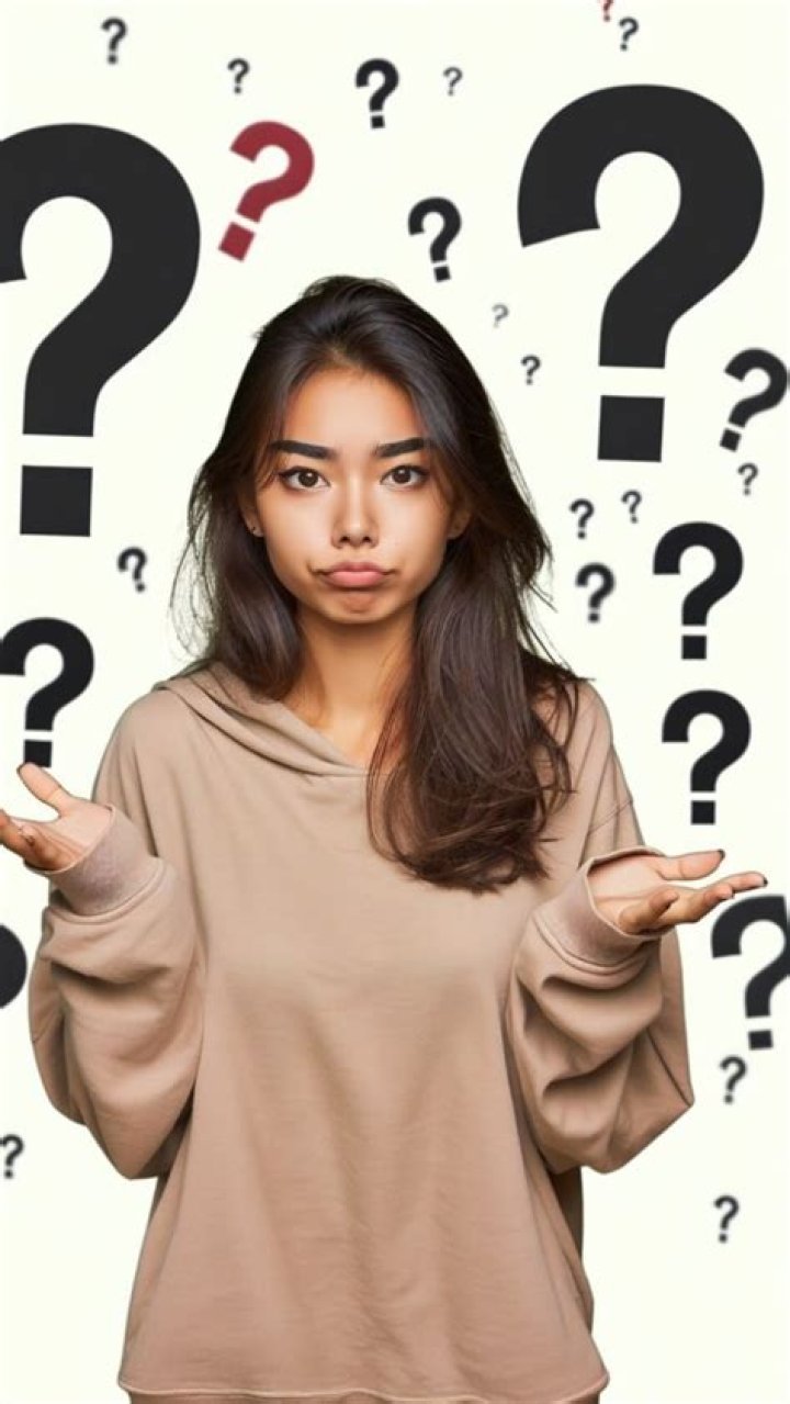 Poses a question to