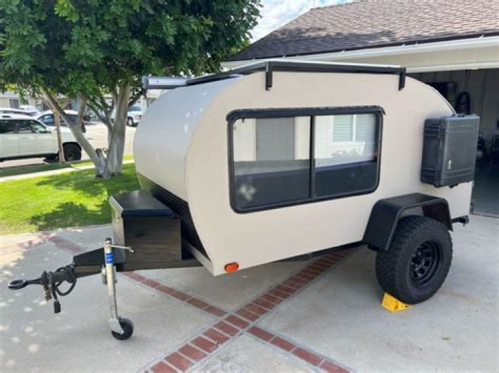 Pull behind as a hitched camping trailer