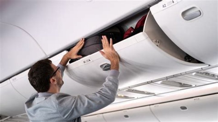 Put in the overhead bin for example
