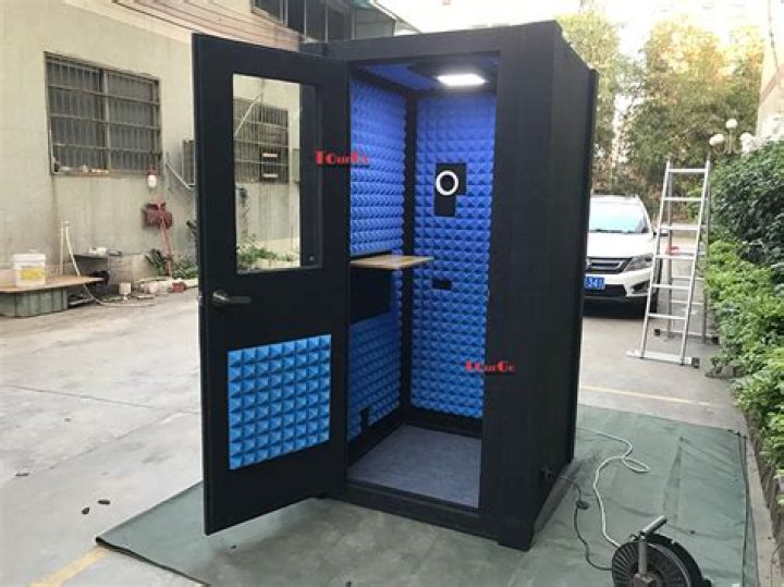 Puts into a soundproof booth perhaps