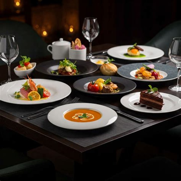 ___ the table (get ready for a meal)